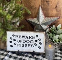 BEWARE OF DOG KISSES